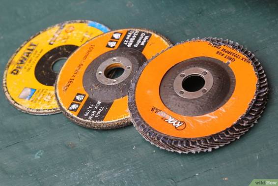 https://www.wikihow.com/images_en/thumb/9/93/Use-an-Angle-Grinder-Step-2-Version-2.jpg/v4-900px-Use-an-Angle-Grinder-Step-2-Version-2.jpg